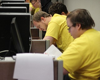 Youngstown State's Cody Rigney (left) and Richard Elrod (right) work together to solve problems during the International Collegiate Programming Competition in Meshel Hall on the campus of Youngstown State University on Saturday morning.  Dustin Livesay  |  The Vindicator  11/8/14  YSU.