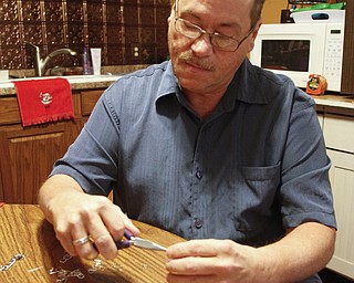        ROBERT K. YOSAY  | THE VINDICATOR..Steve  Dailey..of Boardman - makes handmade jewelry that is quite creative. He also teaches classes in beading...