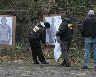        ROBERT K. YOSAY  | THE VINDICATOR..Fraternal Order of Police Lodge 141 set up this firing range for firearms training and qualification for the sheriffÕs deputies it represents off of West Ave.. B. J. Alan Fireworks donated the land and YSU donated the earth for the bullet backstops behind the targets,