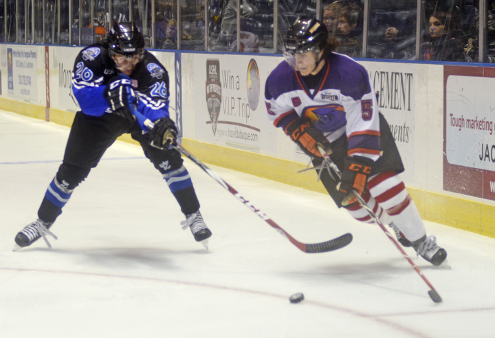 Katie Rickman | The Vindicator...Lincoln Stars Biagio Lerario (#26) attempts to block Phantom's Vas Kolias (#5) during the first period at the Covelli Centre on Sunday, Nov. 16, 2014. Phantoms lost to the Lincoln Stars 3-4 in over time.