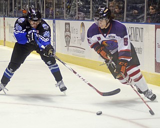 Katie Rickman | The Vindicator...Lincoln Stars Biagio Lerario (#26) attempts to block Phantom's Vas Kolias (#5) during the first period at the Covelli Centre on Sunday, Nov. 16, 2014. Phantoms lost to the Lincoln Stars 3-4 in over time.