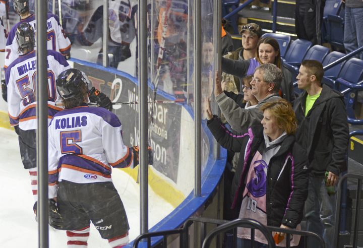 Katie Rickman | The Vindicator.Fans meet the Phantoms around the edge of the rink in support after the loss against the Lincoln Stars in overtime 3-4 on Sunday, Nov. 16, 2014.
