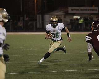  .          ROBERT  K. YOSAY | THE VINDICATOR..Ursulines #39  Vito Penza picks out a hole as Libertys #6  Lynn Bowden looks on ....Ursuline Irish vs Liberty Leopards at Mollenkof Stadium...-30-