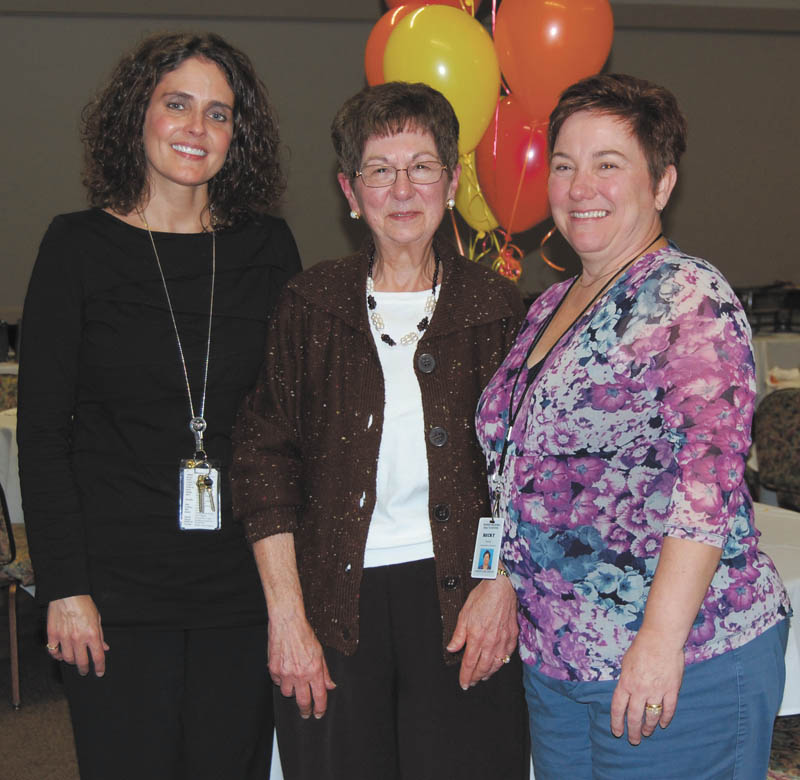SPECIAL TO THE VINDICATOR Rita Vogt, center, received the Janet L. Patterson Award for Volunteer of the Year at Sharon Regional Health System’s annual volunteer awards luncheon. Presenting the award was Sharon Regional’s Michelle Schmader, left. Representing the SRHS Cancer Care Center, where Vogt volunteers, was Becky Foster, right.