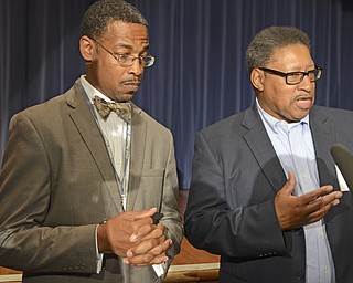 Katie Rickman | The  Vindicator.Local PastorÕs Kenneth Donaldson of Rising Star Baptist Church, on left and Julius Davis of Friendship Baptist Church in Girard speak to press about their presence at East High School and the grief counseling they provided for students on Thursday, Nov. 13, 2014 after the freak accidental death of freshman Faith McCullough-Wooster the day before.