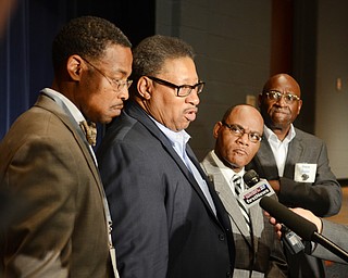 Katie Rickman | The  Vindicator.Local Pastor’s L-R Kenneth Donaldson of Rising Star Baptist Church, Julius Davis of Friendship Baptist Church in Girard, Ernest Ellis of Antioch Baptist Church, and deacon Lloyd Hughes of Rising Star Baptist Church speak to press about their presence at East High School and the grief counseling they provided for students on Thursday, Nov. 13, 2014 after the freak accidental death of freshman Faith McCullough-Wooster the day before.