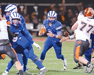 Western Reserve quarterback John Clegg (6) heads up field through a hole created by his linemen during their Division VII regional semifinal against Lucas on Nov. 15 in Orrville. The Blue Devils took down the Cubs, 42-21, and now have their sights on the Flyers of Norwalk St. Paul, who they will take in Saturday’s final at Copley.
