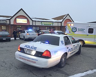        ROBERT K. YOSAY  | THE VINDICATOR.. A police spokesman said a store owner and the man who tried to rob the store exchanged gunfire and both were hit late this afternoon. according to Brad Blackburn - the shooting is under investigation. and Conditions were not known...