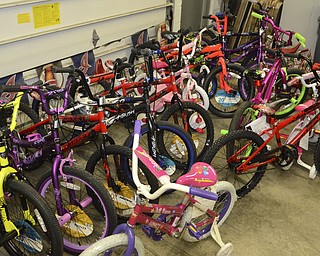 Katie Rickman | The Vindicator.Approximately 50 bikes were donated for Shots for Tots at Masters Bar and Grille in Liberty Twp. on Wednesday, Nov. 19, 2014.