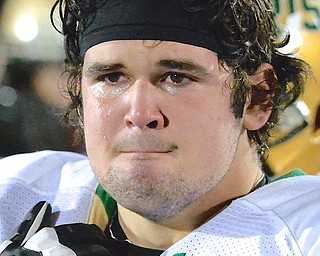 Jeff Lange | The Vindicator  Ursuline senior Robbie Beardman sheds tears after suffering a 20-6 loss to the Canton Crusaders, Saturday evening in the regional finals held at Lake High School.