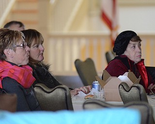 Katie Rickman | The Vindicator.L-R.Mary Grace Fowler, Kathleen Rothmarg, and Lisa Orlando all of Boardman listen to Sister Mary McCormick during a seminar about the history of the Ursuline Sisters at the Tyler History Center in Youngstown on Thursday, Nov. 20, 2014.