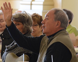 Katie Rickman | The Vindicator.Ray Novotny, an Ursuline Associate, asks Sister Mary McCormick during the seminar about the history of the Ursuline Sisters at the Tyler History Center in Youngstown on Thursday, Nov. 20, 2014.