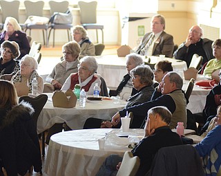 Katie Rickman | The Vindicator.A group listens as Sister Mary McCormick speaks about the history of the Ursuline Sisters at the Tyler History Center in Youngstown on Thursday, Nov. 20, 2014.