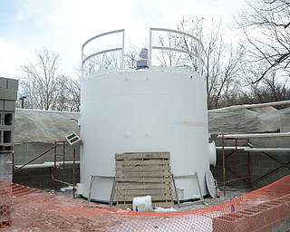 Katie Rickman | The Vindicator.The "Lime Slurry" tank  at the Waste Water Treatment Building in Lowellville on Thursday, Nov. 20, 2014. The construction has temporarily been stopped due to the cold weather.