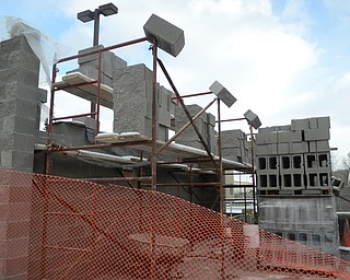 Katie Rickman | The Vindicator.An unfinished wall of the garage where the new "Lime Slurry" tank will be at the Waste Water Treatment Building in Lowellville on Thursday, Nov. 20, 2014. The construction has temporarily been stopped due to the cold weather.