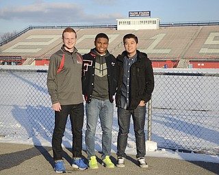 Katie Rickman | The Vindicator.Fitch High School Seniors (L-R) Josh Potkanowicz 17, Garen Gibson 18 , and Taylor Phan 18 are working together for an upcoming walk to raise money for ALS as a part of their English Honors class on Friday, Nov. 21, 2014.  The walk will take place at Fitch track.