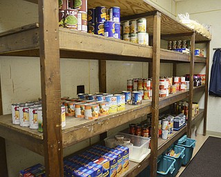Katie Rickman | The Vindicator.The Emmanuel Care Center in Girard offers food and clothing to those in need on Friday, Nov. 21, 2014.