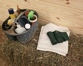        ROBERT K. YOSAY  | THE VINDICATOR..tools of the trade as horse brushes linaments hoof pics . towels and wraps... and of course hay ..Hollywood Gaming /Mahoning Valley Race Course is in the final hours of preparation for Mondays first race with a post time of 12:45 on Monday ..-30-