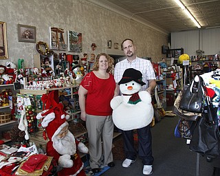        ROBERT K. YOSAY  | THE VINDICATOR.. Gary Wolf, Vanessa Malailua of  Life Treasures in Struthers..Three thrift stores popped up in downtown Struthers the past month. At least one other thrift store opened in Struthers this past year, bringing the number of thrift stores there to seven or eight. ..-30-