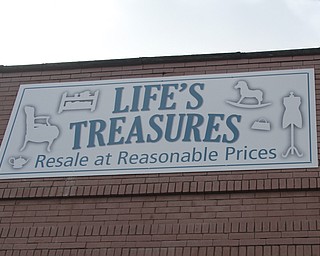        ROBERT K. YOSAY  | THE VINDICATOR.. Gary Wolf, Vanessa Malailua of  Life Treasures in Struthers..Three thrift stores popped up in downtown Struthers the past month. At least one other thrift store opened in Struthers this past year, bringing the number of thrift stores there to seven or eight. ..-30-
