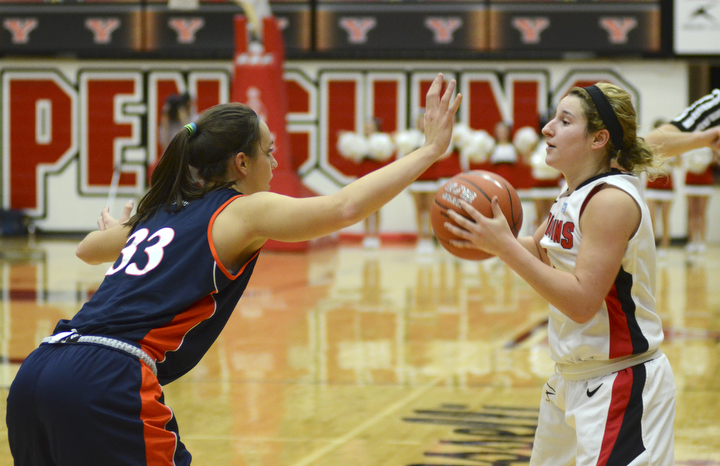 Katie Rickman | The Vindicator.Bucknell's Carly Richardson (33) attempts to block YSU's Nikki Arbanas (4) pass during the first period during the game at the Beeghly Center Tuesday, Nov. 25, 2014.