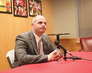 Youngstown State athletic director Ron Strollo listens to a question Tuesday during a news conference at Beeghly Center. YSU officially announced the firing of Penguins football coach Eric Wolford Tuesday after the news broke Monday night. Strollo took questions about the move and the start of the search for Wolford’s replacement.