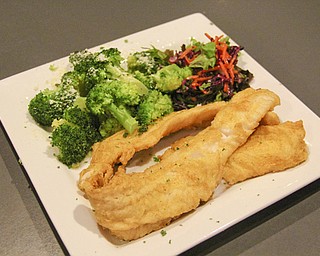 Walleye dinner with steamed broccoli at Donavito’s Italian Grille.