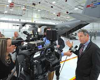 Jeff Lange | The Vindicator  Senator Sherrod Brown speaks to press about future intentions of upgrading the C-130 Hercules airplanes at the Youngstown Air Reserve Base in Vienna, Monday morning in the hangar. Upgrades must be made by the year 2020 in order for the planes to meet federal and international standards.