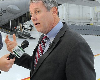 Jeff Lange | The Vindicator  Senator Sherrod Brown speaks to press about future intentions of upgrading the C-130 Hercules airplanes at the Youngstown Air Reserve Base in Vienna, Monday morning in the hangar. Upgrades must be made by the year 2020 in order for the planes to meet federal and international standards.