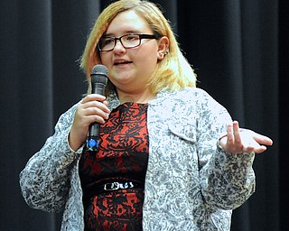 Jeff Lange | The Vindicator  Kylie Thomas explains to judges how her group's restaurant "Kam and Anthony's" plans on having their food shipped during Struthers Middle School's "Wildcat Cage" a spinoff of the TV show Shark Tank, Monday afternoon.