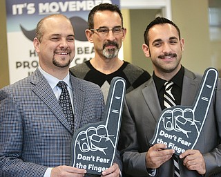        ROBERT K. YOSAY  | THE VINDICATOR..holding the symbols for prostate health are Daniel   Ricchiuti Daniel    Jon Sherman and Jonathan  Fauvie.. Mercy Health Youngstown, formerly Humility of Mary Health Partners, Man Up Mahoning Valley, Mercy Health Youngstown Cancer Centers, Mercy Health Foundation, NEO Urology and Partners for Urology Health will close out ÔMovemberÕ with an official shave-off at