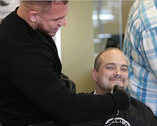        ROBERT K. YOSAY  | THE VINDICATOR.. Daniel Ricchiuti   gets his beard starting to remove by Excalibur  Alex Sanchez ..Mercy Health Youngstown, formerly Humility of Mary Health Partners, Man Up Mahoning Valley, Mercy Health Youngstown Cancer Centers, Mercy Health Foundation, NEO Urology and Partners for Urology Health will close out ÔMovemberÕ with an official shave-off at