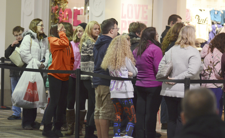 Katie Rickman | The Vindicator.A line forms outside of a store at Southern Park Mall on Thursday, Nov. 27, 2014. Customers who waited outside of the mall anticipated the early start to their Christmas shopping.