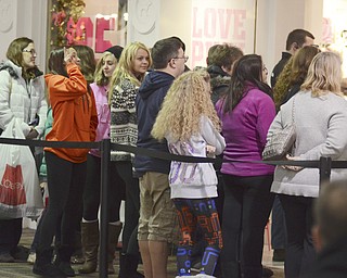 Katie Rickman | The Vindicator.A line forms outside of a store at Southern Park Mall on Thursday, Nov. 27, 2014. Customers who waited outside of the mall anticipated the early start to their Christmas shopping.