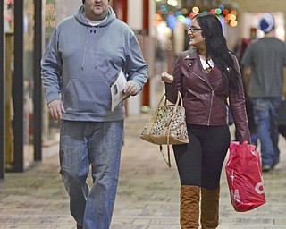 Katie Rickman | The Vindicator.Brittany Farris of Youngstown and her father Lance Farris start their holiday shopping at Southern Park Mall on Thursday, Nov. 27, 2014.  They plan on shopping all through the night.
