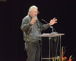 Katie Rickman | The Vindicator.Fred "Fast Freddie" Woak of 93.3 The Wolf speaks about Jim Traficant Jr. during the tribute for Traficant at the Deyore Performing Arts Center on Sunday, Nov. 2014 Youngstown, Ohio.