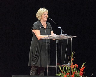 Tish Traficant, wife of former Congressman James A. Traficant Jr., speaks during the closing of the tribute
for him Sunday at the DeYor Performing Arts Center’s Edward W. Powers Auditorium in Youngstown. An
estimated 2,500 family members, friends, colleagues and others attended the two-hour gathering.