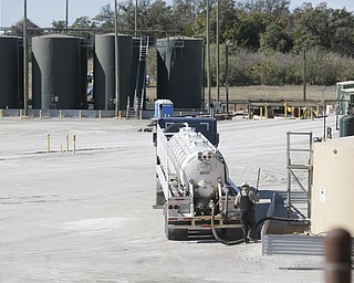 In this Nov. 19 photo, a fracking wastewater storage facility sits just outside the city limits of Reno, Texas. The rural community sits surrounded by hydraulic-fracturing drilling operations and is considering passing a municipal ban on fracking within the city limits.