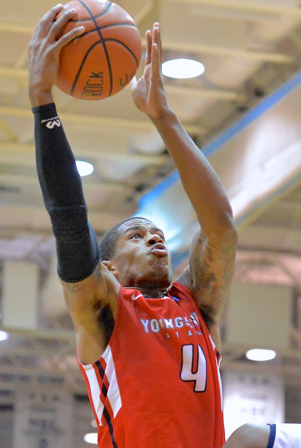 Jeff Lange | The Vindicator  Youngstown's Shawn Amiker looks to the basket as he goes for a layup in the second half, Tuesday evening in Moon, PA.
