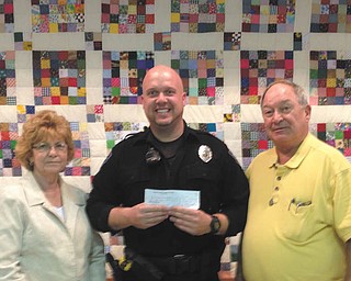 SPECIAL TO THE VINDICATOR: Niles F.O.P. Lodge 27 has announced its annual winter project, which is feeding senior citizens. Dinner for seniors will be served from 11 a.m. to 12:30 p.m. Dec. 17 at the Niles S.C.O.P.E. Senior Center. From the left are Judy Fabian, Niles Senior Center co-manager; Patrolman Mike Biddlestone, president of F.O.P. 27; and Ray Novotny, Niles center co-manager.