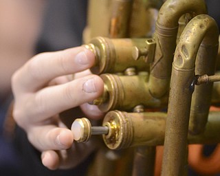 Katie Rickman | The Vindicator.A student plays a tuba during the jazz band practice at Struthers Middle School on Tuesday, Dec. 2, 2014.  More than 30 students have joined the extracurricular jazz band at the middle school.