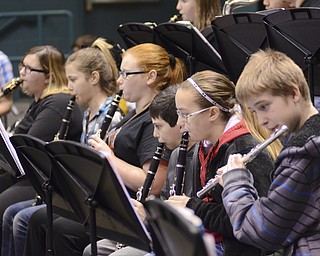 Katie Rickman | The Vindicator.Students in the Struthers Middle School jazz band (L-R)  Kylie Thomas 8, Faith Morlan 6, Maggie Lucarelli,8, Vince Macciomei 6, Kiley Ritenour 7, and Jacob Neely 6 practice the song "White Christmas" during a practice at the school on December 2, 2014.  The band has an upcoming performance Thursday Dec. 4, 2014.