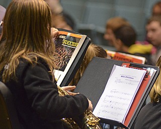 Katie Rickman | The Vindicator.A student relaxes during a short break at the jazz band practice at Struthers Middle School on Tuesday, Dec. 2, 2014.