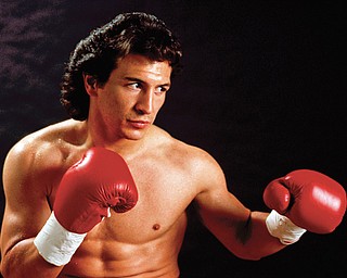 Lightweight boxing champion Ray “Boom Boom” Mancini poses for a publicity photo in March 1989. On Thursday, the Youngstown native was notified that he was one of the 2015 International Boxing Hall of Fame inductees.