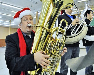 Jeff Lange | The Vindicator  YSU tuba professor Brian Kaiser plays Christmas tunes with the group of tubas during Saturday's Tubachristmas concert held at the Eastwood Expo Center in Niles.