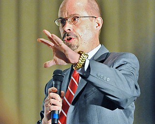 Jeff Lange | The Vindicator  John Allen, associate editor of Boston Globe and senior Vatican analyst for CNN, speaks to the First Friday Club of Greater Youngstown about Pope Francis, Thursday afternoon during the group's luncheon at Antone's Banquet Center in Boardman.