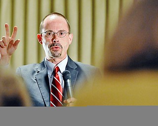 Jeff Lange | The Vindicator  John Allen, associate editor of Boston Globe and senior Vatican analyst for CNN, answers questions about Pope Francis during First Friday Club of Greater Youngstown's luncheon at Antone's Banquet Center in Boardman.