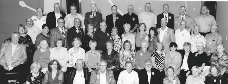 Celebrants of the 50th reunion of Austintown Fitch High School class of 1964 are, front row from left, Elaine Shively, Kathy Gray Kotuch, Jim Glodde, Bob Sutton, Mike Beaudis, Joe Surman, Tila Parker Luschin, Marjo Swagger Sangree and Diane Pormen Mangrum; second row, Rick Miskell, Jill Hooker Stokle, Cindy Danner Yaksich, Ruth Bugno Lees, Bobbie Sharp Kennedy, Ruth Desmond Sutton, Holly Smart Carter, Celesta Simcox Dennison, Janet Dulik Heffron, Carolyn Houlette Edgel and Caroline Willoughly Porter; third row, Carol Johnson Miskell, Norm Inchak, Jane Jones Schaffer, Don Kovach, Bob Rodkey, Ron Whetson, Diane Shaw Balas, Lynda Williams Main, JoLee Carlisle Keller, Cherl Fowler Sanor, Brian Bowser, John Schinker, Jim Lude and Ray Schafer; and back, Denny Beck, Ray Miskell, Ron Sabatino, Curt Rodgers, Earl Decker, Ken Gustafson, Larry Hinchclipe, Ron Wertz, John Buckner and John Jakubec. Special to The Vindicator 
