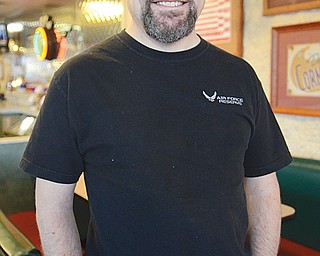 Brent Davis, recently retired public-affairs officer for the 910th Airlift Wing at Youngstown Air Reserve Station in Vienna, sports a beard and mustache he didn’t have when he was a civilian Air Reserve technician and a member of the Air Force Reserve.