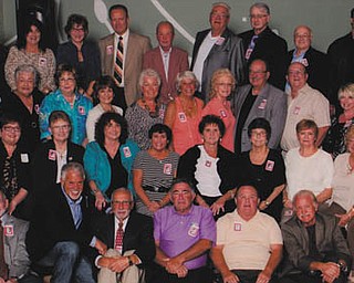 Also celebrating the 50th reunion of Austintown class of 1964 are, front row from left, Larry Pallanda, Fred Lawrence, Dick Menning, Wayne Camacci, Phil DeSalvo, Howard Hartzell, Bob Pallo, Rod Cameron, Clyde Anderson and Don Learn; second row, Paula Sanders Patkonicky, Gretchen Selikson Luckage, Carol Varner Hope, Beverly Dimick Koehnle, Carol Allen, Bernice Schaffer O’neil, Linda Passarelli, John Driscoll McCoy, Marjorie Young Sinclair, Gail Johnson, Peg Lesko Callen, Donna Boesch Glover, Nancy Denicholas Jones and Joan Sailor Thwaite; third row, Jackie Loeb McCormick, Janice Jenkins Alexander, Ilona Johnson Sudimack, Barb Lapushanky McGinn, Jackie Kimmel Miller, Jayme Crisafi, Pat Williams Brouwer, Kathy Barry Todd, Carol Vail Masiello, Mitch Bellotta, Tom Lealand, Sandi Taylor Pallo, Chip Glover, Mike Blott and Gary Buckley; and back, Janice Hunt Swart, Betty Cooper Goldner, Holly Smart Carter, Peggy Bellstrom Pachuk, Crawford Tyree, Steve Napolitano, Mike Dobransky, John Hamilton, Jim Miller, Ray Chalfant and Dale McCoy. Special to The Vindicator 
